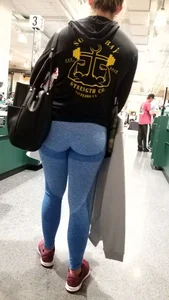 Milf with a nice ass in tight blue leggings at Dick's