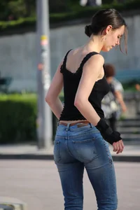 Skinny Girl in Tight Jeans on a Skateboard Candid Photos Gallery