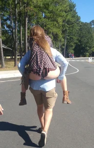 Girl in Mini Shorts with Hot Ass Riding on Her Boyfriend’s Back