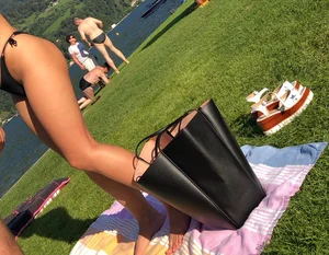 Sexy candid girl in a thong bikini with a nice mound and ass