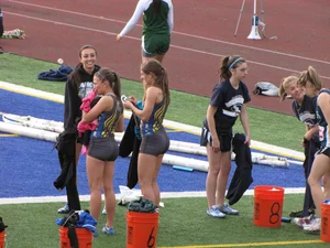 Group of Teens in Shorts at the Stadium