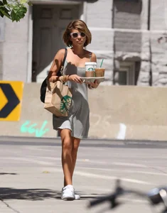Sarah Hyland showing pokies while braless in a dress