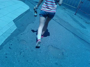 Slim Legs of a Young Candid Girl in Denim Shorts Street Creepshots, Flat Booty