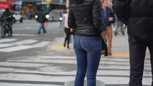 Brunette lady in tight jeans with a great ass