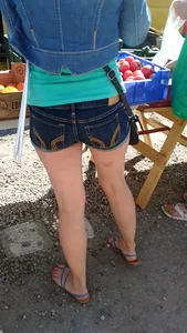 Nice stocky legs and booty in denim shorts, candid girl at the street market