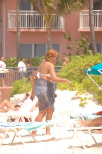 Bunch of sexy girls and milfs in bikinis at the beach