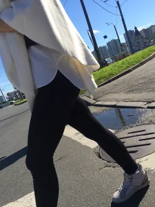 Blonde Girl With Fit Muscular Legs in Tight Black Jeans and Sneakers on a Crosswalk  - Street Creepshots Collection
