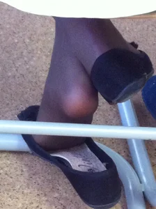 College candid teens' flats under desk, dangle creepshots