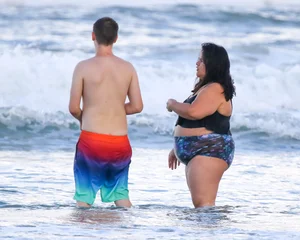 Extra thick girl at the beach in a bikini