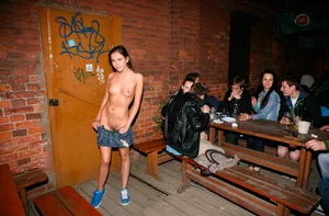 Only one is nude - group photos where only 1 girl is naked, and the rest of the people are dressed