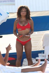 Christina Milian in red bikini in Miami with hard nipples