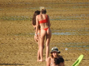 Hot ass beach blonde babe in little red thong