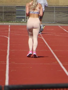 A Runner Candid Girl in Sport Leggings With a Chunky Ass And Legs Jogging at the Stadium Creepshots