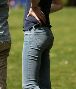 Cute brunette with a nice little booty in tight jeans