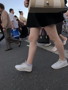 Candid girl wearing a short skirt crossing the street, awesome pale legs