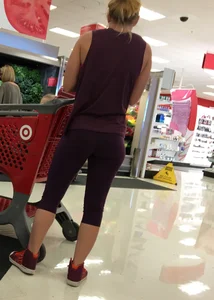Blonde bubble butt babe shopping in tight purple leggings