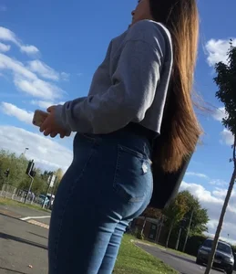 Long haired beauty teen with a tight ass in jeans