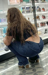 Curly hair lady in jeans @