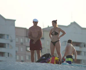 Stocky Milf in Swimsuit Standing on Sand Beach Creepshots