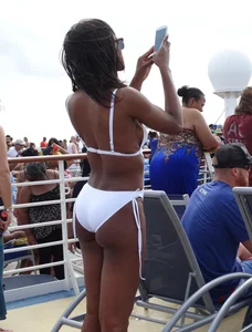 Sexy Ebony babe on a cruise in white bikini