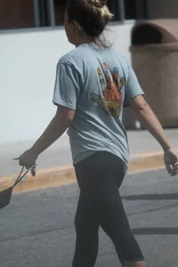 Girl going to TJ Maxx walking in the parking lot in leggings