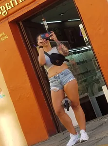 Nice legs and a little peach showing, shorts