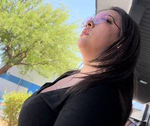 Latina milf picking up her son