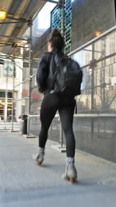 Black spandex and little grey boots crossing the street - such a cutie