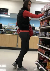 Skinny and tall milf shopping at Target in tight leggings