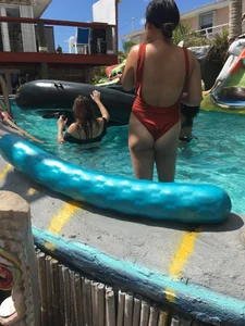 Petite Filipina wearing a one piece bathing suit