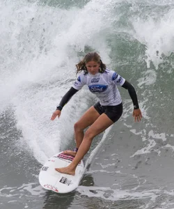Candid surfer babes on the beach and in bikinis