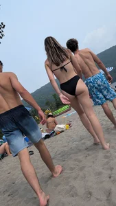 beautiful tight brunette hair girl in black bikini. OC