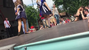 Cute blonde performer upskirt while she performs (part 2)