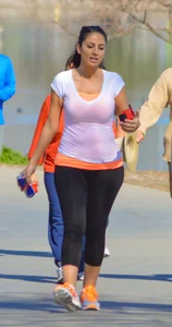 Thick lady walking in leggings with a big booty