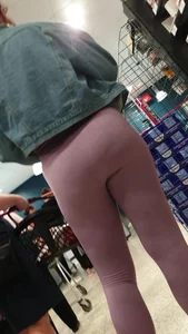 Shopping girl ass view in que
