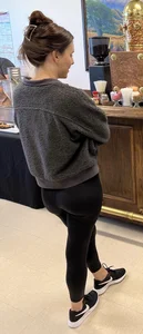 Firm ass in leggings, candid girl in a cafe