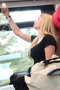 Hot busty blonde on train