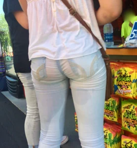 Girl in wet jeans making them semi see through