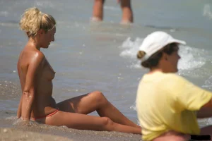 A bunch of sexy beach voyeur babes in bikinis, thongs and topless