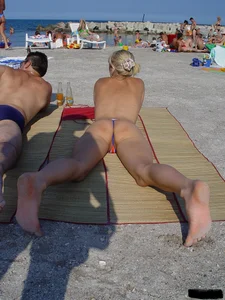Beach voyeur girls in bikinis, thongs and topless
