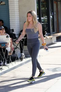 Hilary Duff in grey tights leaving Alfreds Coffee in Studio City