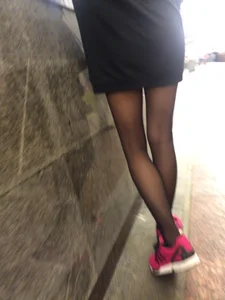 Girl in Black Pantyhose and a Skirt Subway Candid