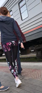 Skinny Teen With Nice Thin Legs in Spandex Tights Hugging Her Friends at a Railway Station Photos