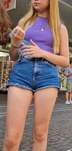 Awesome candid blonde teen in denim shorts closeup, nice legs