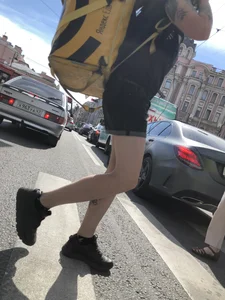 Amazing cute candid food delivery girl with lots of tattoos crossing the street