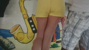 Milf in yellow shorts with vpl and a wedgie