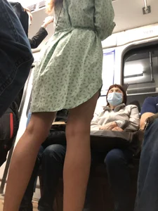 Girl in a Dress With Sexy Legs in Subway and on a Street