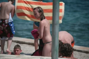 3 amazing topless girls on a nudist beach