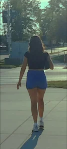 Sexy Candid Girl in a Top And Blue Shorts Walking Down the Street Creepshots Gallery
