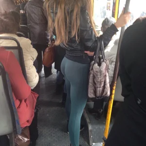 Girl in Green Leggings and Leather Jacket Bus Creepshot